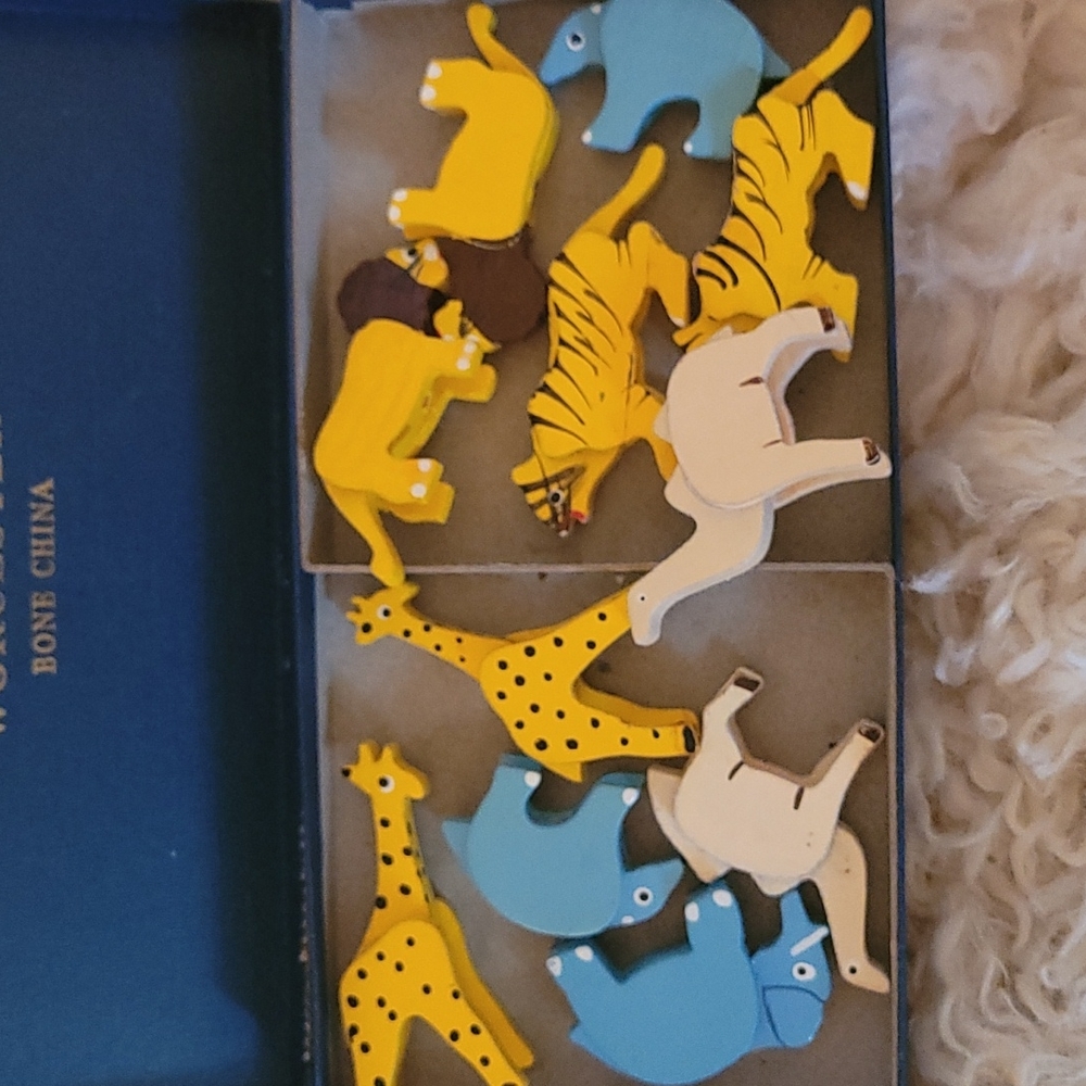 Vintage wooden animals for birthday candels